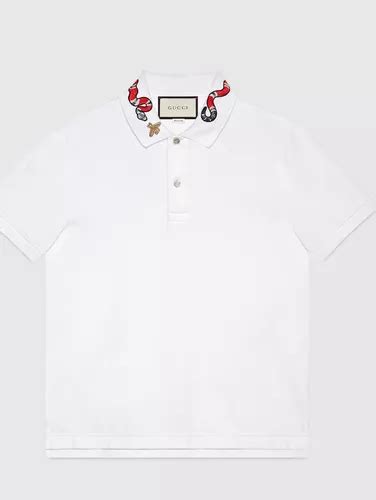 polo gucci con serpente